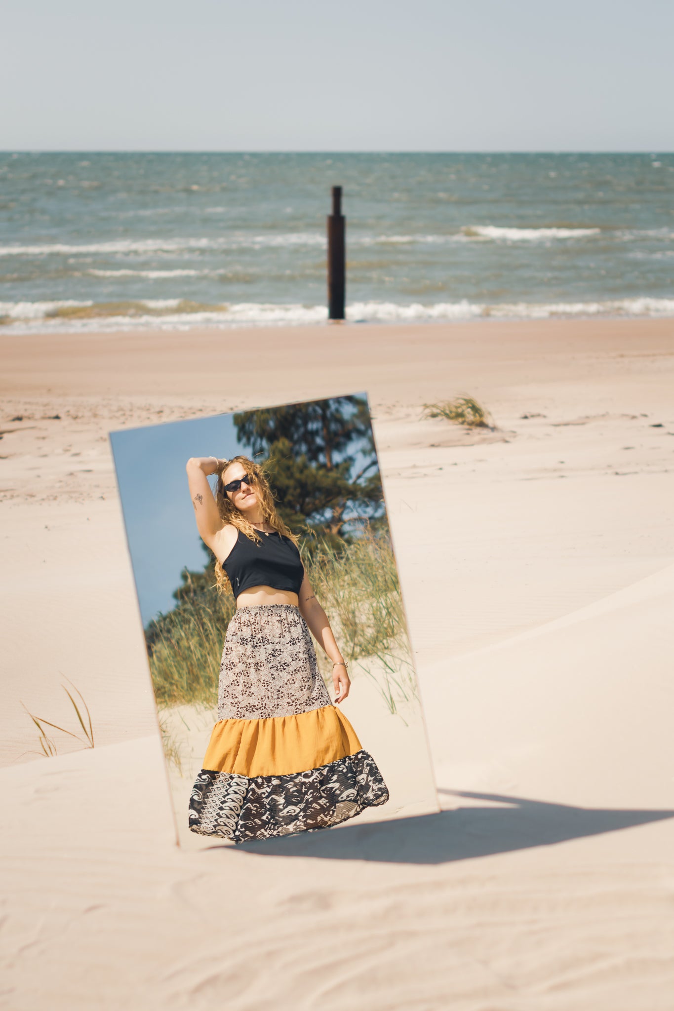 Full length butter yellow boho maxi skirt with flowy tiered silhouette