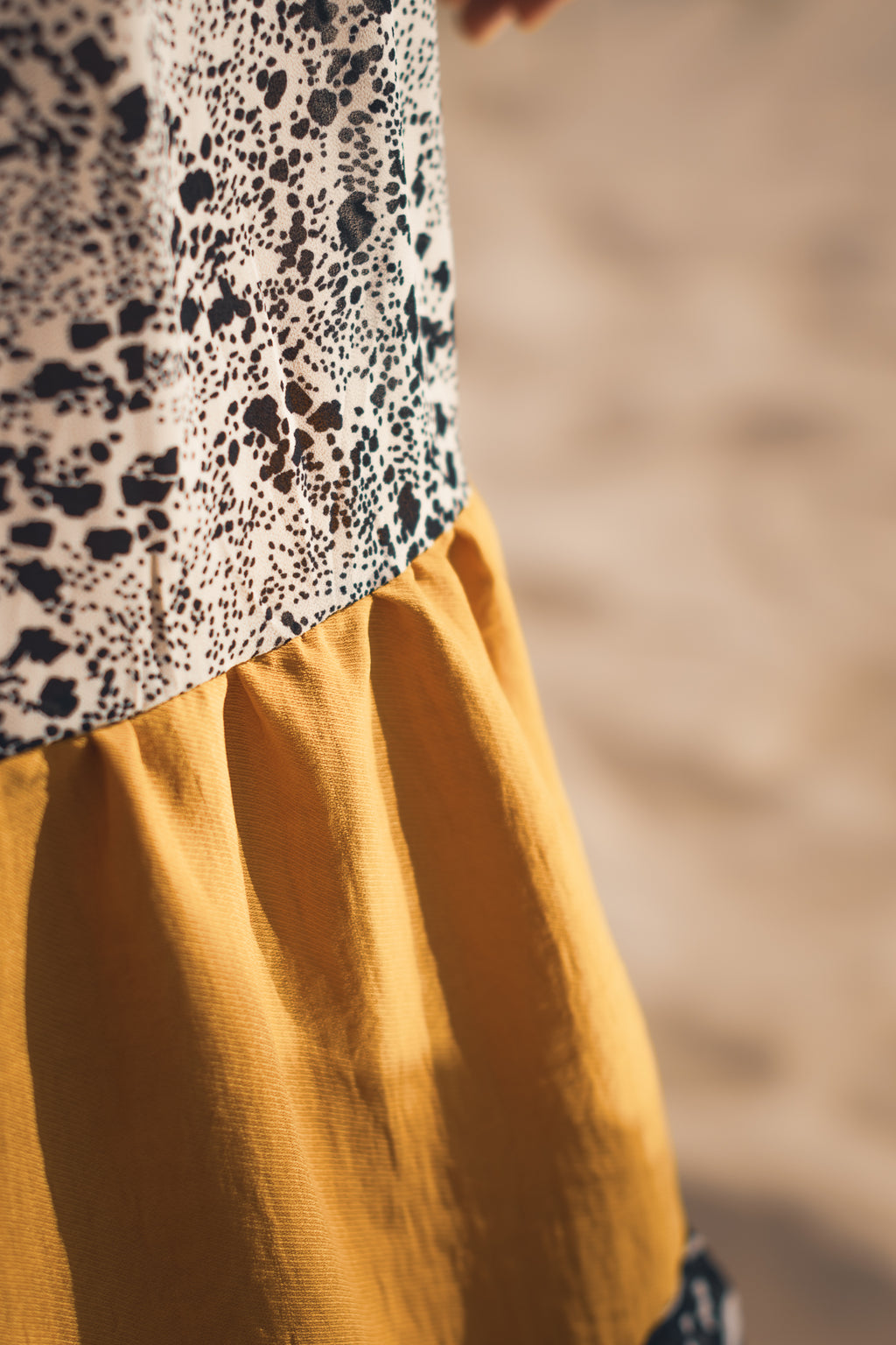 Soft butter yellow fabric texture of handmade tiered skirt