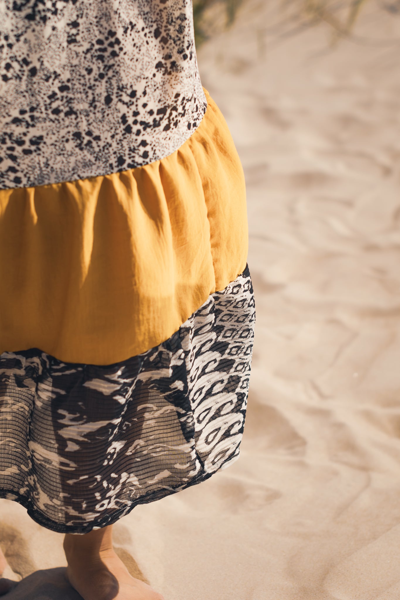 Butter yellow boho tiered skirt styled for festival outfit