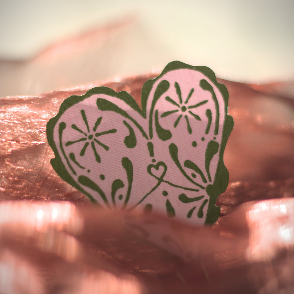 fabric texture of iron on heart appliqué