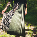 Handmade emerald green slit midi skirt photographed in natural light