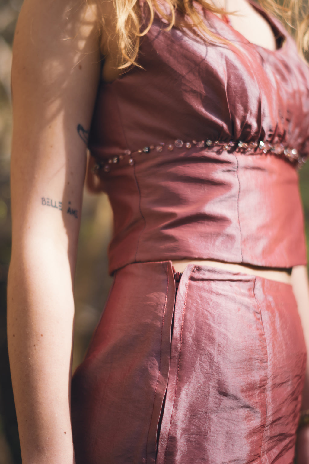 Handmade upcycled hot pink skirt set photographed in natural light