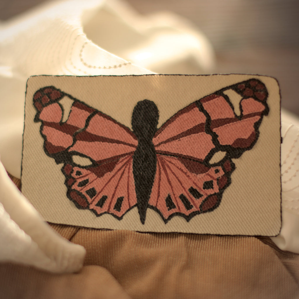 small butterfly patch for slow fashion outfit