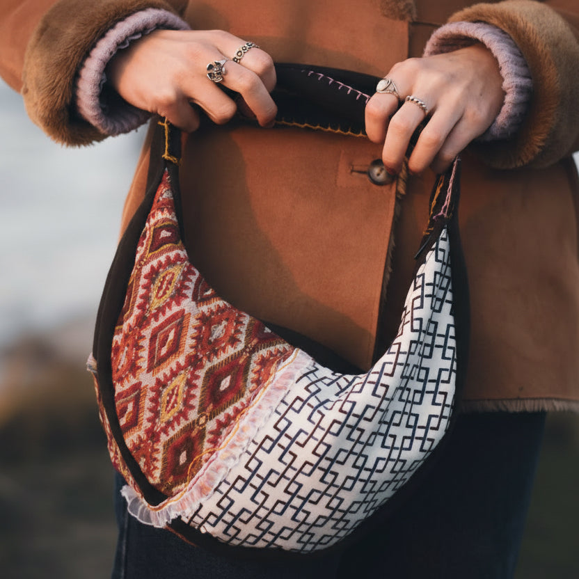 Reversible side of handmade upcycled hobo bag showing two-piece design, eco-friendly sustainable handbag