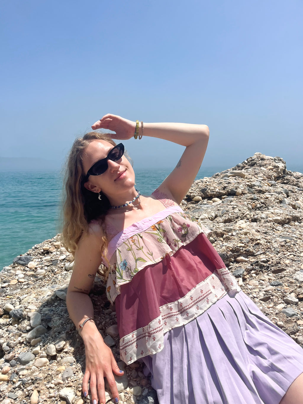 Handmade hot pink crop top styled for festival outfit