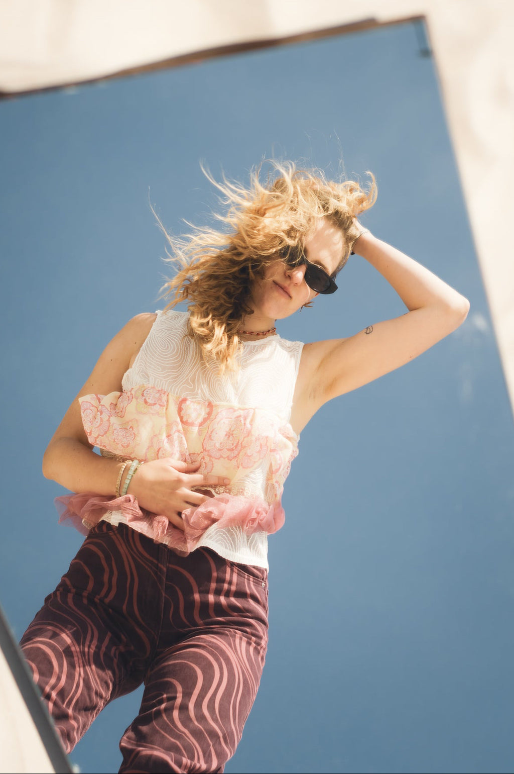 Upcycled boho blouse styled on model for summer outfit